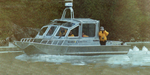 Karen Duquette photographing the other jetboat